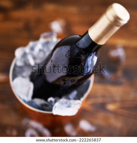 wine bottle in ice bucket