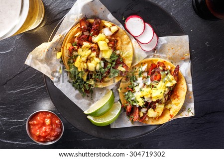 mexican street tacos with beer shot top down