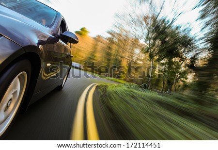 Front side view of speeding car Front side view of speeding car
