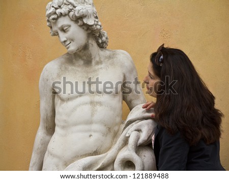 Woman and statue