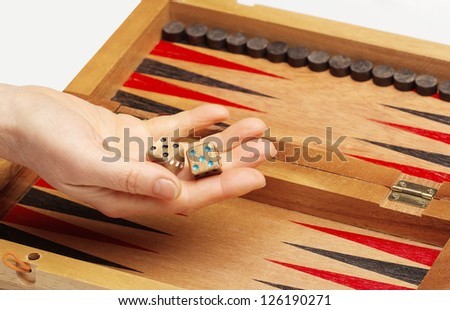 Wooden handmade backgammon board and two dices