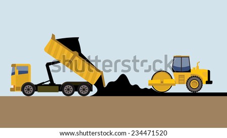 road roller and truck making road