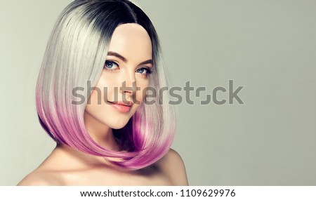 Beautiful hair coloring woman. Fashion Trendy haircut.Ombre bob short hairstyle. Blond model with short shiny hairstyle. Concept Coloring Hair. Beauty Salon
