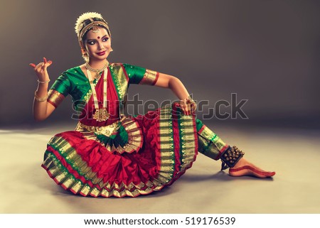 Beautiful indian girl dancer in the posture of Indian dance . Indian classical dance bharatanatyam .