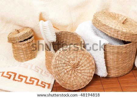 woven baskets with bath accessories
