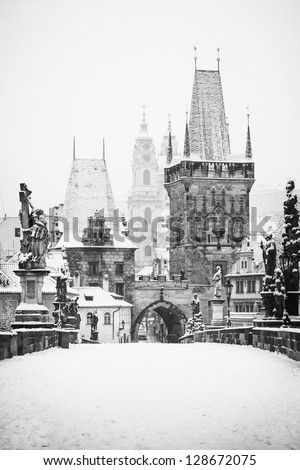 black and white shot of Charles bridge in winter, Prague, Czech Republic