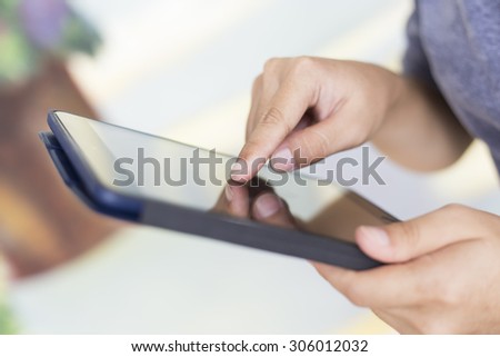 Woman Using Tablet: Close Up
