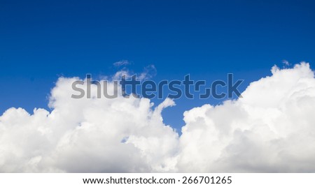 Pillow made of white clouds in the deep blue sky