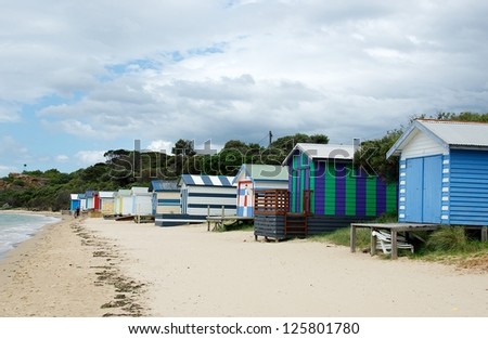 Many typical colorful fisherman\'s houses on a beach in Australia with sand and sky view, australian fisherman houses, colourful beach in Australia, Melbourne