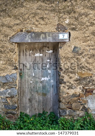 Old door fragment with wall background, old door texture view, abstract scene, old pattern abstract, close up, object close up view, old building fragment, nobody lives, closed door view