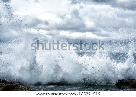 Huge wave explosion close up HDR effect, big wave, storm in the sea, stormy day and big waves in the sea, water sparks