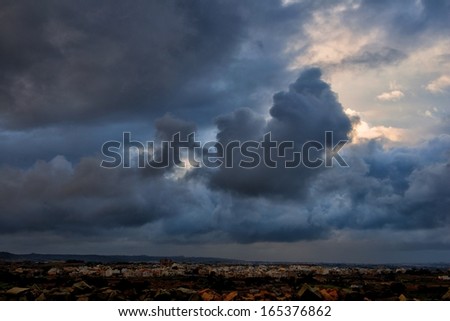 Stormy day background, stormy day with the huge cloudy sky background, maltese landscape, Malta nature, Malta landscape, clouds formation, dramatic sky, saturated, dramatic autumn sky in Malta,concept