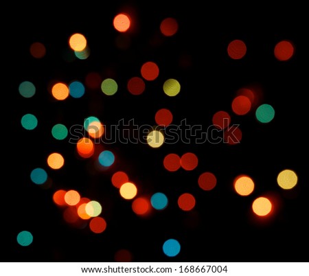 Various multicoloured bubles close up in dark light background, festival celebrities photo, bubbles,Christmas, New Year, Colorful bokeh. Bokeh, abstract light background.Holidays background.Festive