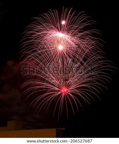 Amazing fireworks isolated in dark background with building silhouethe on the bottom close up with the place for text, Malta fireworks, festival, 4 of July, Independence day, New Year, explode colors