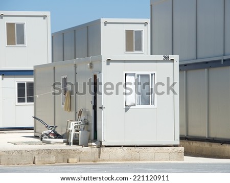 Buildings for immigrants, living place for immigrants, life conditions, immigrants area in Malta, immigrants life, migration, people migration, migration problems, metal houses