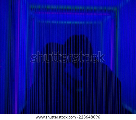 Romantic photo of couple silhouette in romantic blue light in the darkness, man and woman heads silhouette in a dark, blue blur photo, romantic atmosphere, love, people silhouettes