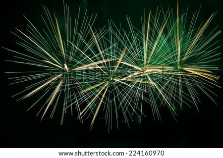 Green fireworks background,explosion close up in dark background, green fireworks texture,