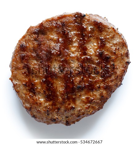 Single grilled hamburger patty isolated on white from above.