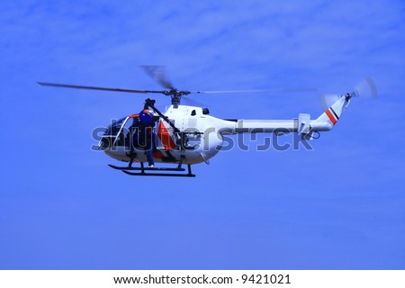 coartguard helicopter on a rescue mission demonstration