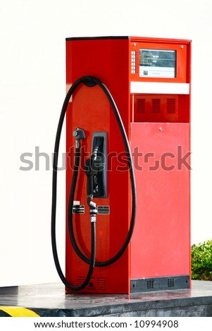shabby lone gasoline pump on a self-service station