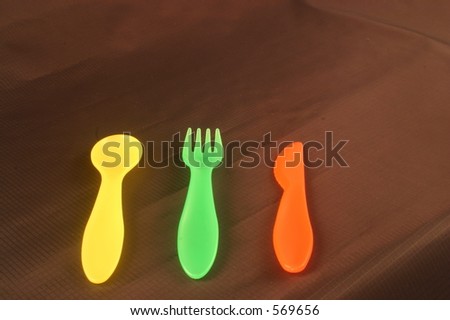 Children's plastic spoon, knife and fork
