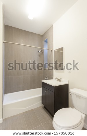 A Bathroom In A Studio Apartment.