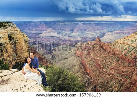 A couple on a honeymoon trip at  Grand Canyon, Arizona