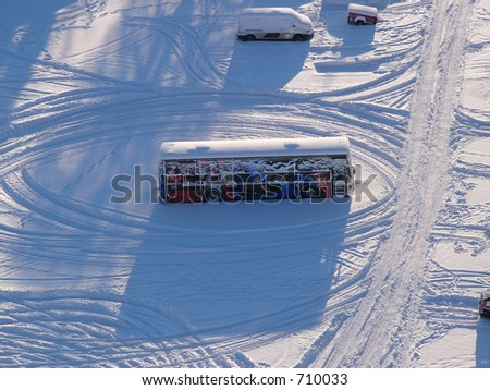 Aerial view of bus in heavy snow