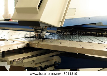 High precision CNC sheet metal stamping and punching machinery.