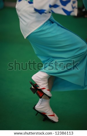 Legs of traditional japanese dancer with flip-flops