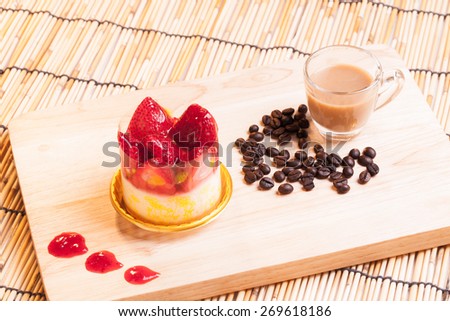 strawberry cheese cake on wood.