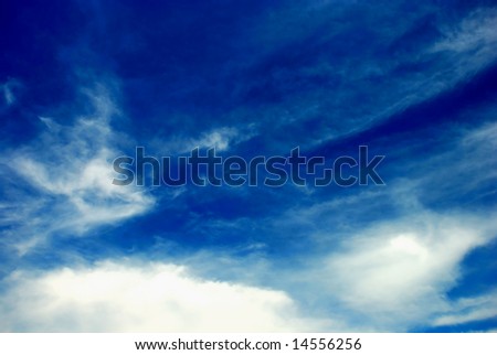 Blue sky and white clouds as a concept of clean and fresh nature, freedom or background