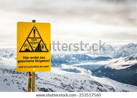 End of controlled ski area sign in austrian Alps