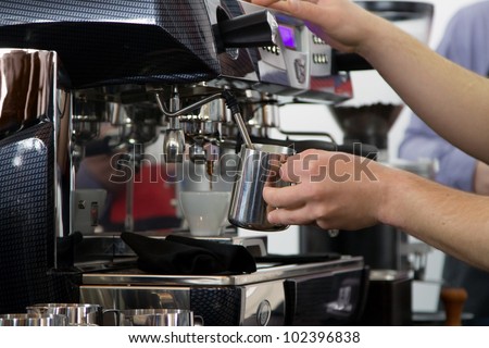 Professional coffee machine closeup with selective focus
