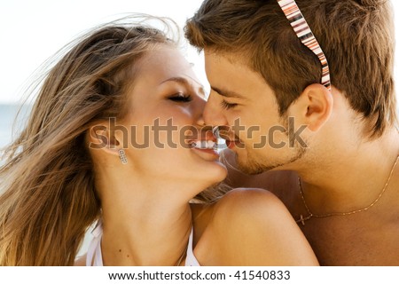 couple kissing images. Romantic couple kissing on