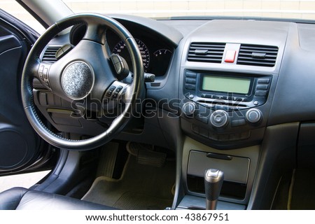 stock photo Modern car dashboard and front seats view