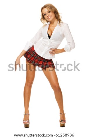Lovely sexy girl in checkered short skirt on white background