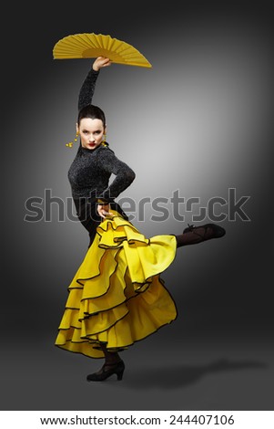 Flamenco dancer in a yellow skirt