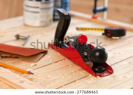 Woodworking tools on a carpenter\'s table.