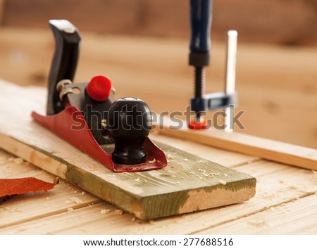 Woodworking tools on a carpenter\'s table.