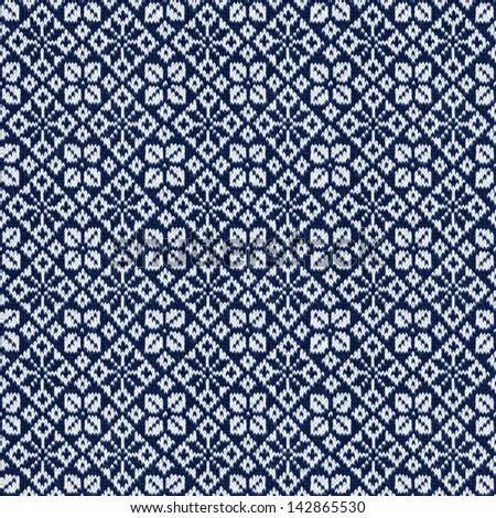 Blue scandinavian style knitted pattern. Seamless repeating texture made from real detailed photo.