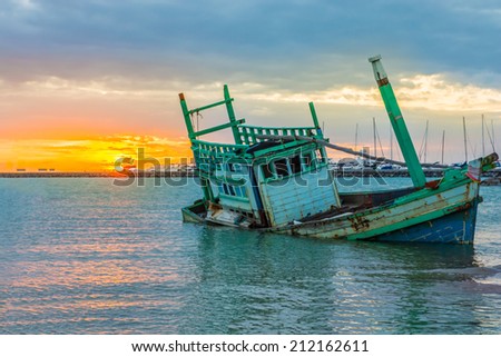 Boat capsized in the Sea