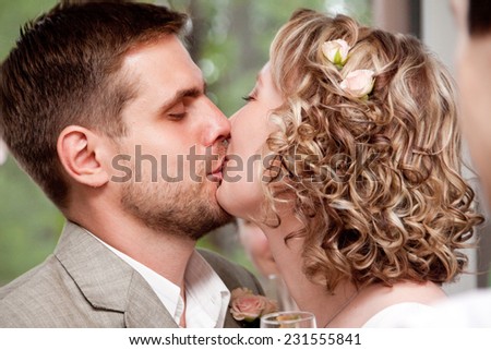 Happy just married couple kissing
