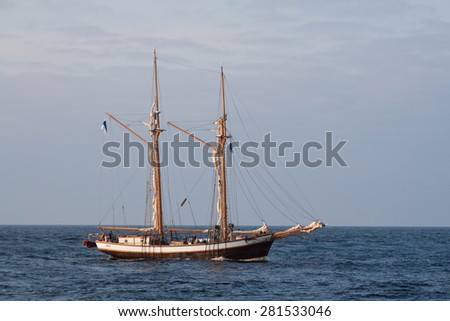 RIGA, LATVIA - JULY 25, 2013: Regatta The Tall Ships Races. Sailing ship come from the sea into the river Daugava