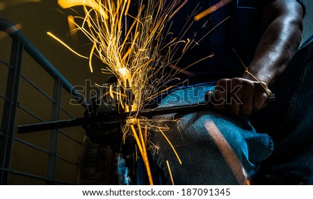 cut the steel rod using grinding machine