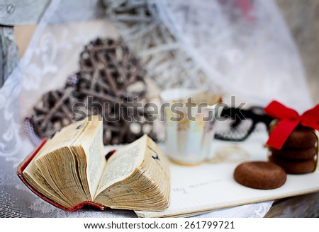 vintage books, with coffee cup and spectacles