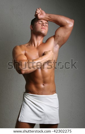 Muscle handsome young male model in studio
