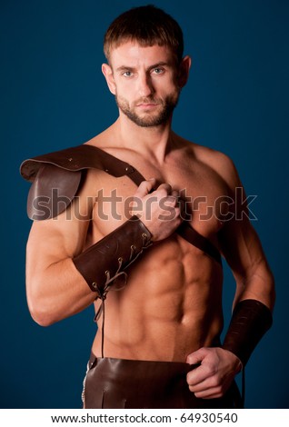 Muscled male model in warriors suite