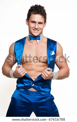 Muscled male model in blue dance suite on isolated white