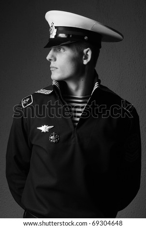 Portrait  of a young model in navy uniform